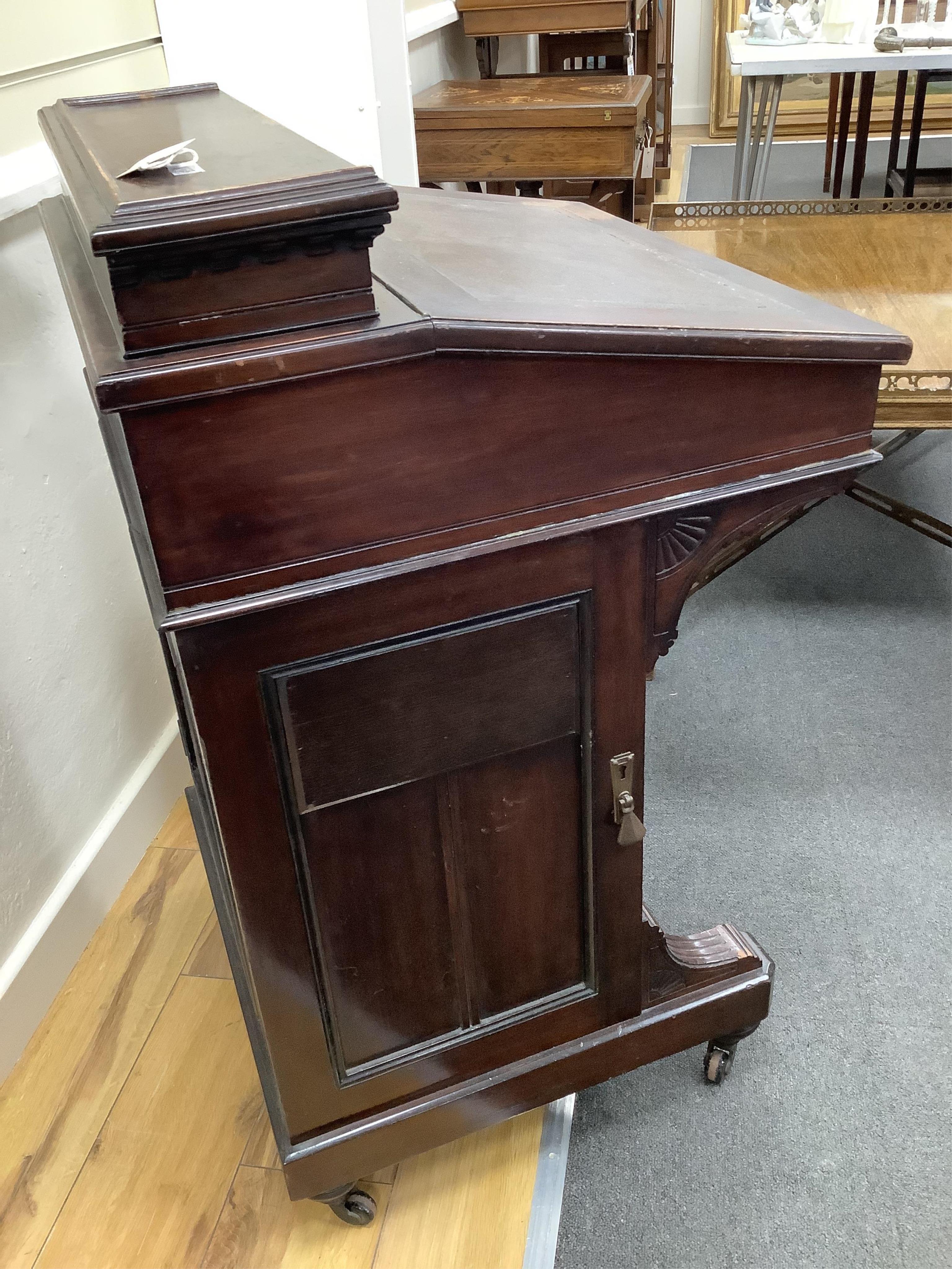 A late Victorian mahogany davenport, width 55cm, depth 56cm, height 93cm. Condition - fair